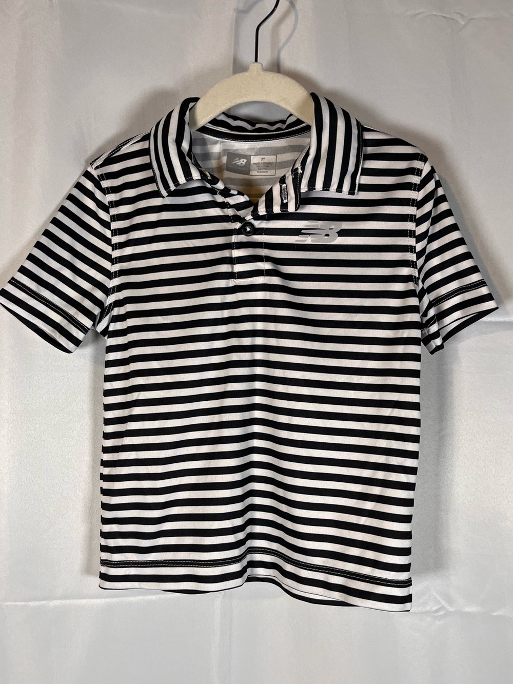 New Balance Kids Black and White Striped Polo